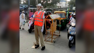 জ্যাম মোকাবিলায় রাস্তায় দাঁড়ালো পুতুল ট্রাফিক পুলিশ
