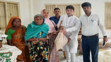 ঝিনাইগাতীতে পাহাড়ি ঢলে ক্ষতিগ্রস্ত দুই হাজার পরিবার পেল চাল