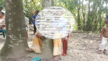 পাওনা টাকা না পেয়ে গাছে বেঁধে রিকশাচালককে মারধর